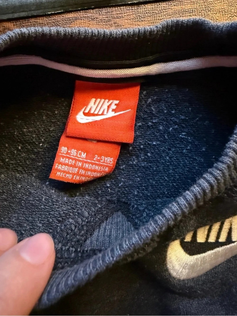 Nike Gray Sweatshirt with White Swoosh and Red Tag